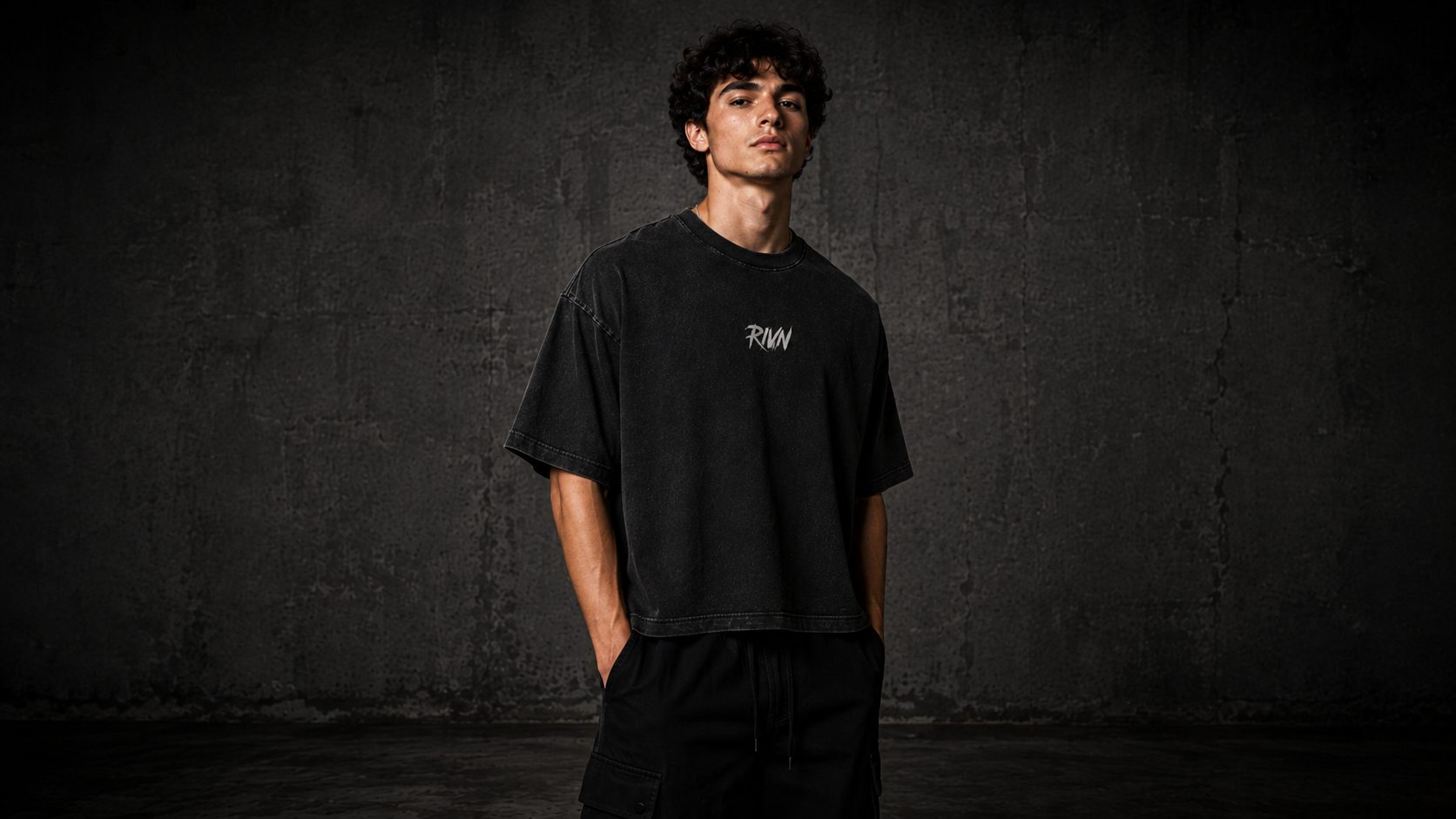 First Cut heavyweight tee detail 2, washed matte black — RIVN FC-001