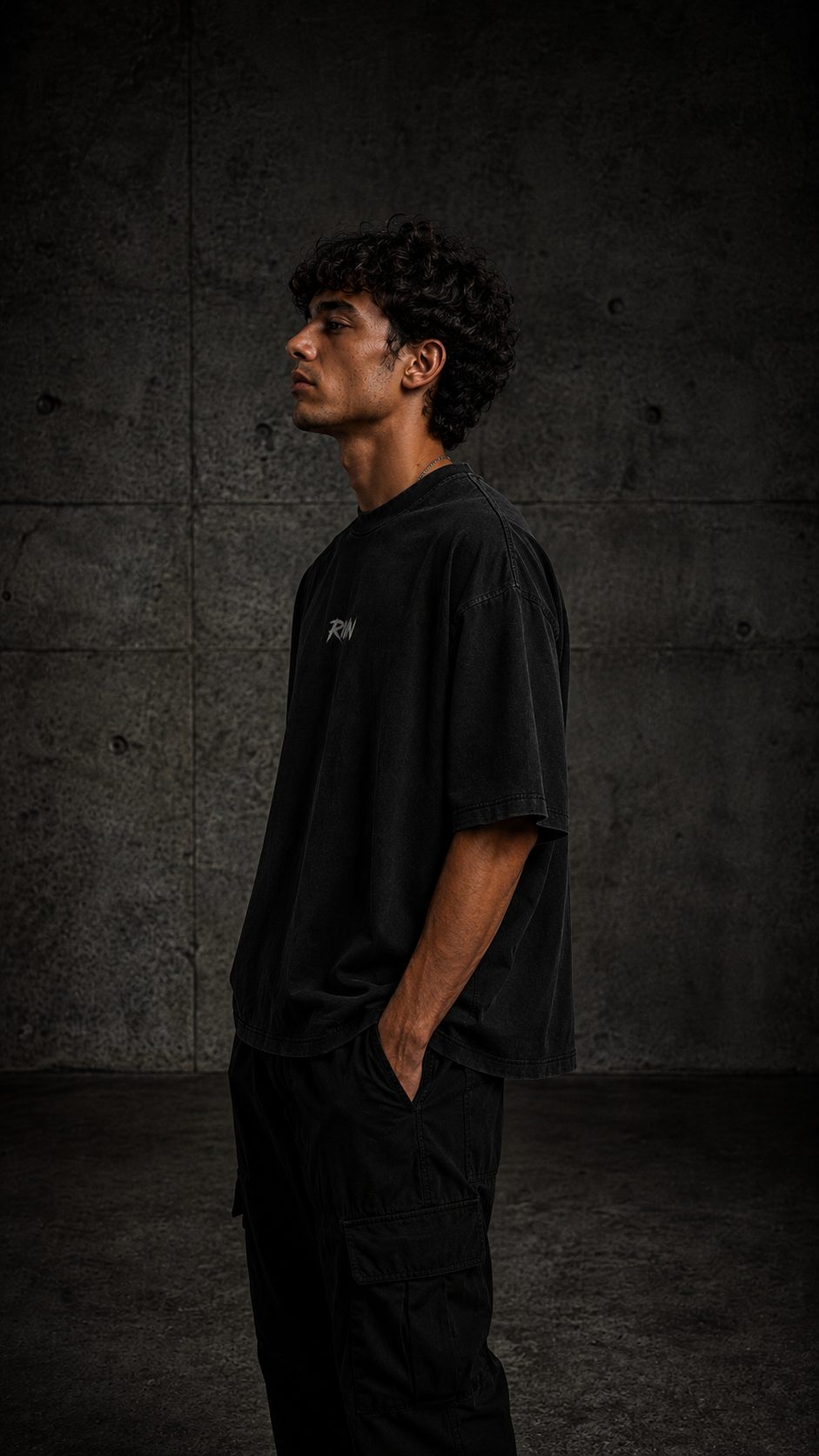 First Cut heavyweight tee detail 3, washed matte black — RIVN FC-001